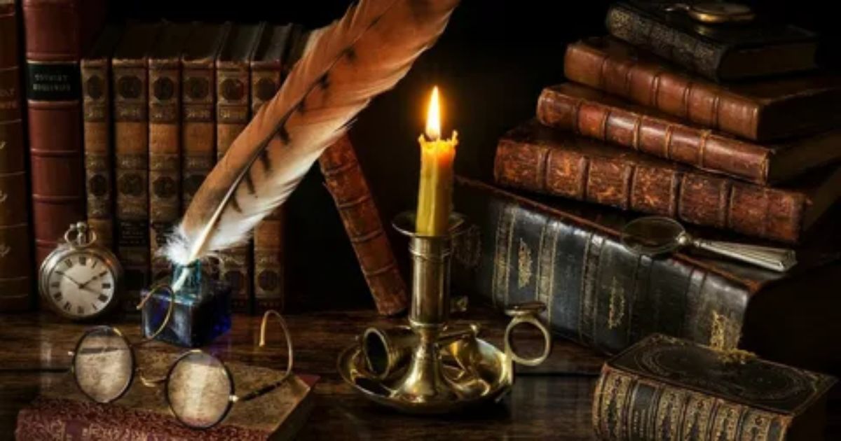 Poem of Praise concept with vintage books, candle light and feather quill