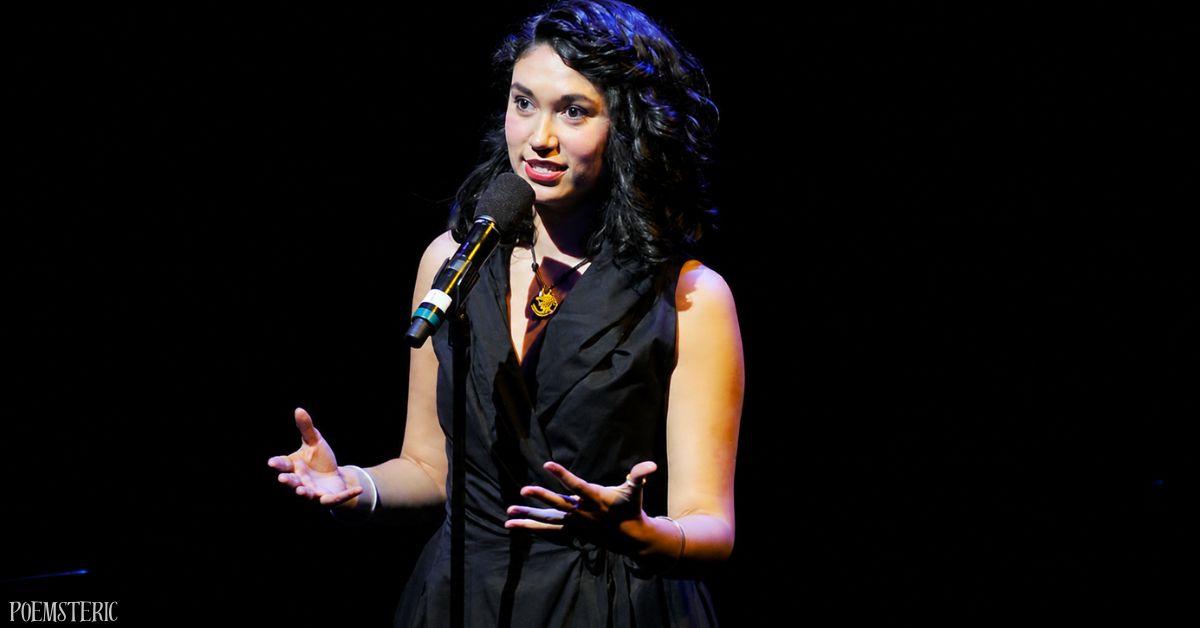 Spoken word poet performing on stage — Sarah Kay poems live performance