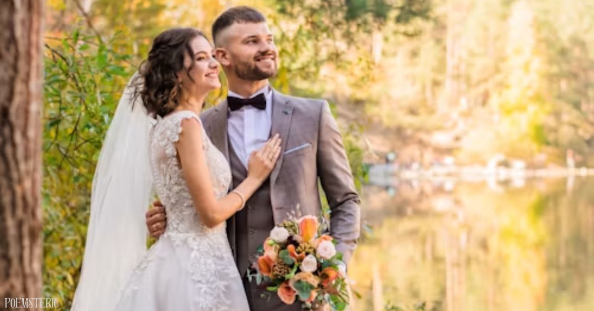 Bride and groom smiling together by a lakeside, surrounded by autumn trees, holding a colorful bouquet , a wedding poem moment captured outdoors.